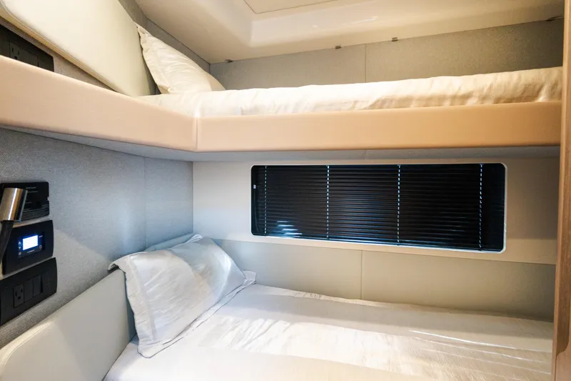 Andromeda Yacht Photos Pics 2023 Azimut Fly 50 yacht interior with modern bunk beds and sleek design.