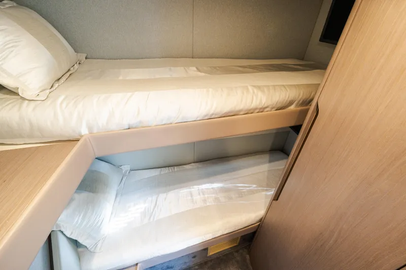 Andromeda Yacht Photos Pics 2023 Azimut Fly 50 yacht interior with cozy twin bunk beds.