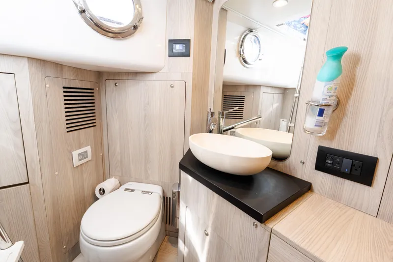 Andromeda Yacht Photos Pics Modern bathroom in 2023 Azimut Fly 50 yacht with sleek design and amenities.
