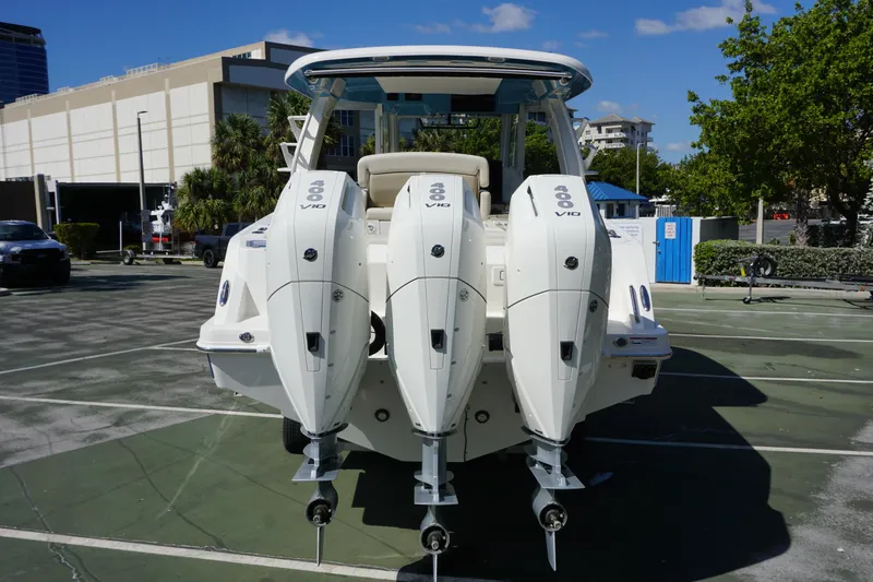 Bwce0015f324 Yacht Photos Pics 2024 Boston Whaler 350 Realm with triple outboard engines, rear view.