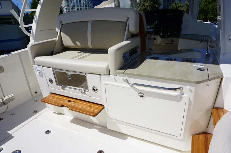 Bwce0015f324 Yacht Photos Pics 2024 Boston Whaler 350 Realm boat interior with seating and storage compartments.