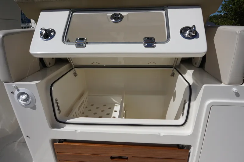 Bwce0015f324 Yacht Photos Pics Open storage compartment on 2024 Boston Whaler 350 Realm boat.