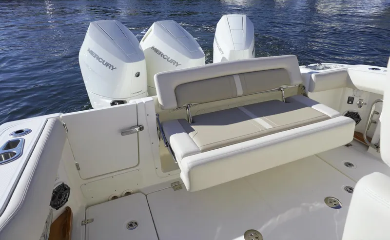 Bwce0015f324 Yacht Photos Pics 2024 Boston Whaler 350 Realm boat with Mercury engines and foldable seating.