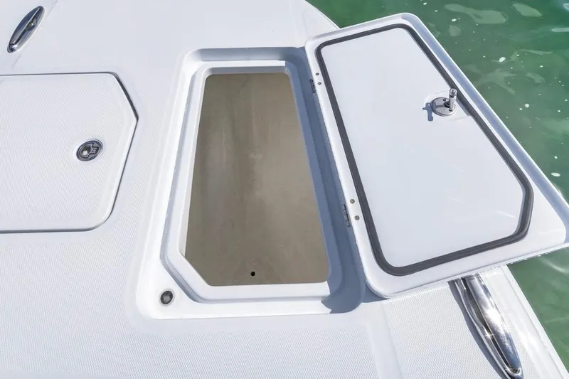  Yacht Photos Pics Open storage compartment on 2026 Invincible 33 Catamaran, showcasing sleek design and functionality.