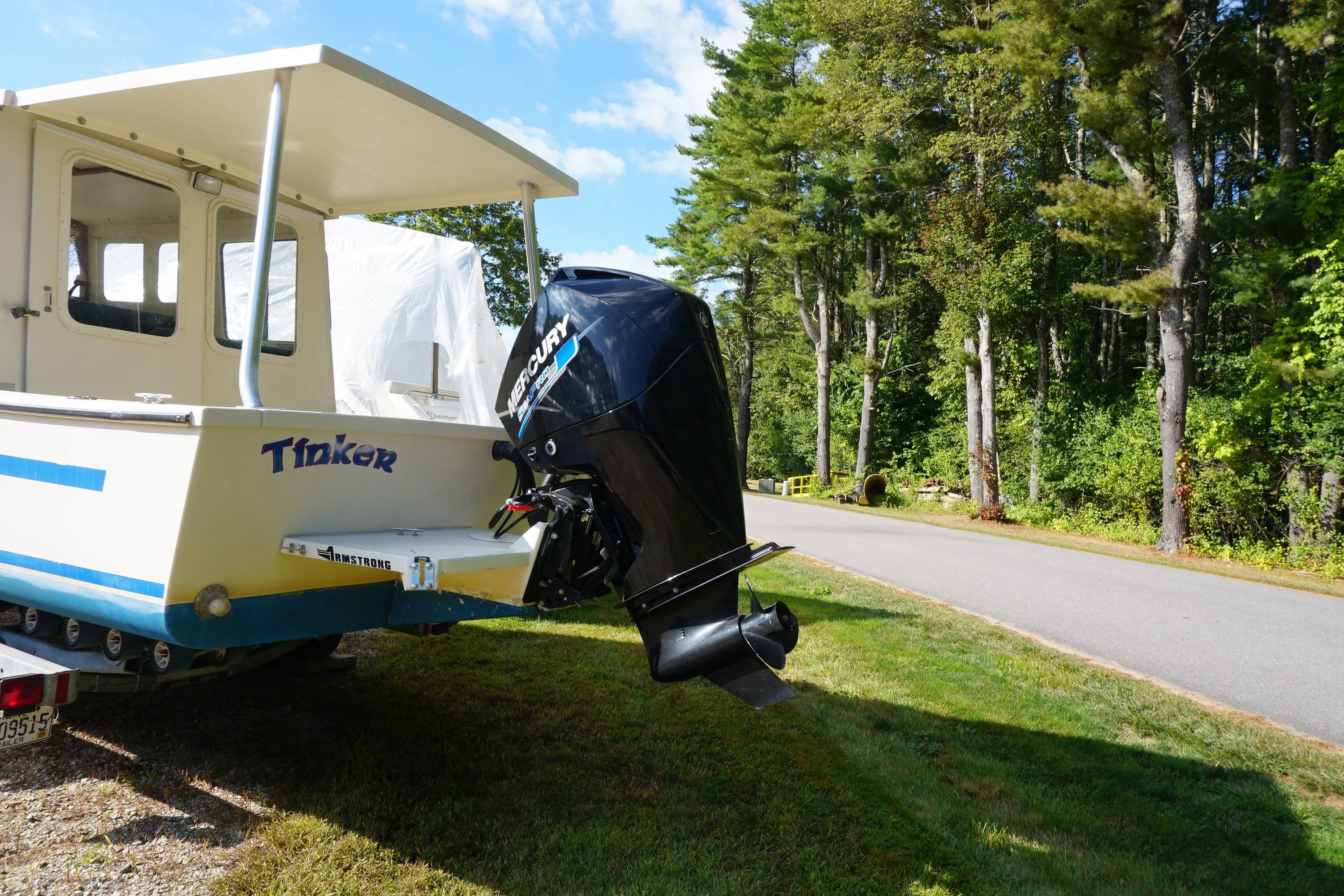 2002 Rosborough RF-246 Sedan Cruiser with Mercury outboard motor on trailer.