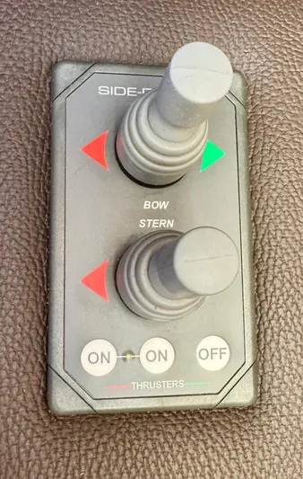 Lone Ranger Yacht Photos Pics 2017 Ranger Tugs Sedan thruster control panel with dual joysticks for bow and stern navigation.