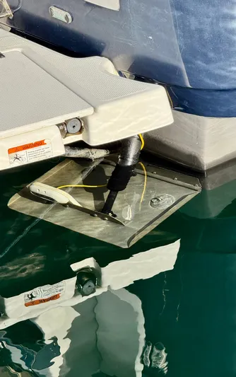 Lone Ranger Yacht Photos Pics 2017 Ranger Tugs Sedan boat detail with trim tab in water.