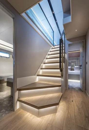 Numarine 26xp-29 Yacht Photos Pics Interior of 2025 Numarine 26XP yacht, featuring modern staircase with ambient lighting.