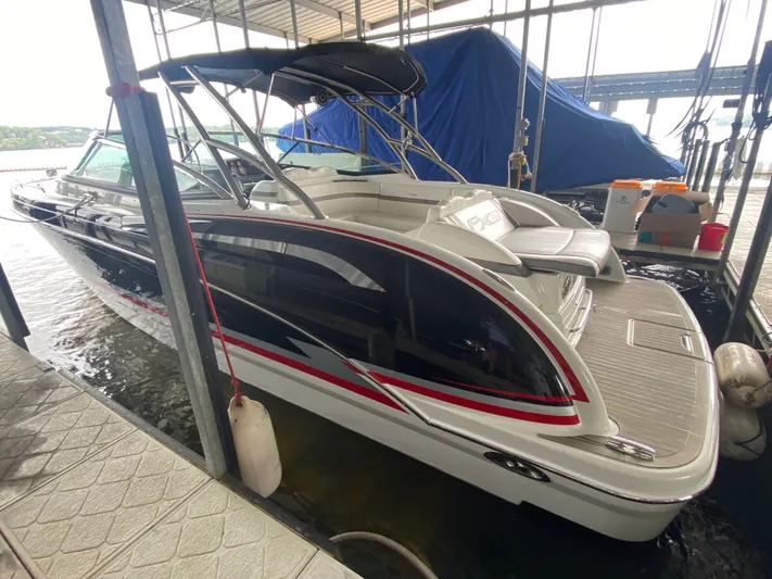  Yacht Photos Pics 2012 Formula 350 SS FX6 boat docked in marina, side view.