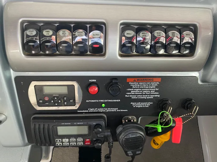  Yacht Photos Pics Control panel of 2012 Formula 350 SS FX6 boat with switches and communication devices.