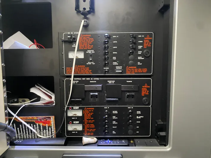  Yacht Photos Pics Control panel of a 2012 Formula 350 SS FX6 boat with switches and wiring.