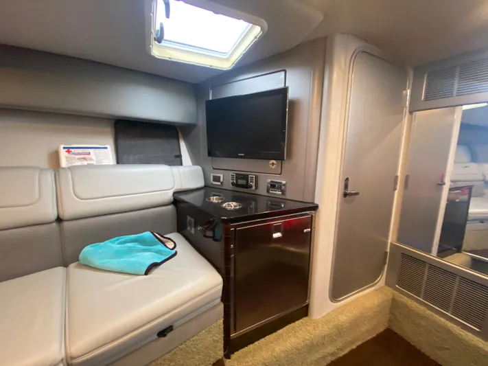  Yacht Photos Pics 2012 Formula 350 SS FX6 cabin interior with seating, TV, and kitchenette.