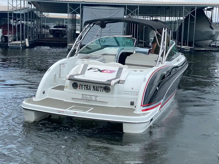  Yacht Photos Pics 2012 Formula 350 SS FX6 boat docked in marina, rear view.