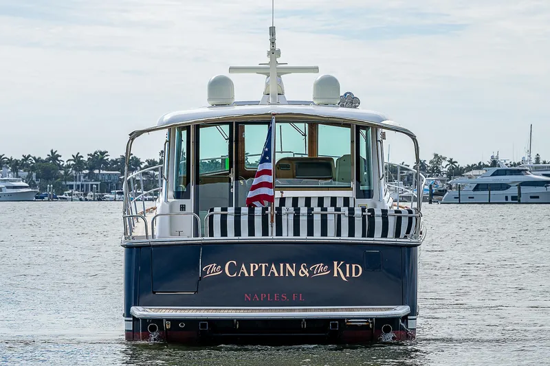 Captain And The Kid Yacht Photos Pics 2012 Sabre 48 Salon Express yacht, "The Captain & The Kid," docked in Naples, FL.