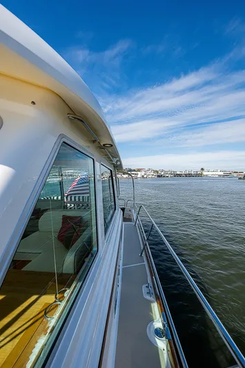 Captain And The Kid Yacht Photos Pics 2012 Sabre 48 Salon Express yacht on water, showcasing sleek design and scenic view.