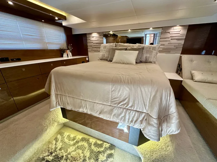  Yacht Photos Pics Luxurious bedroom interior of 2020 Cruisers Yachts 50 Cantius with modern decor.