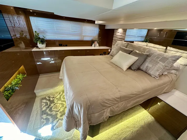  Yacht Photos Pics Luxurious bedroom interior of 2020 Cruisers Yachts 50 Cantius with modern decor.