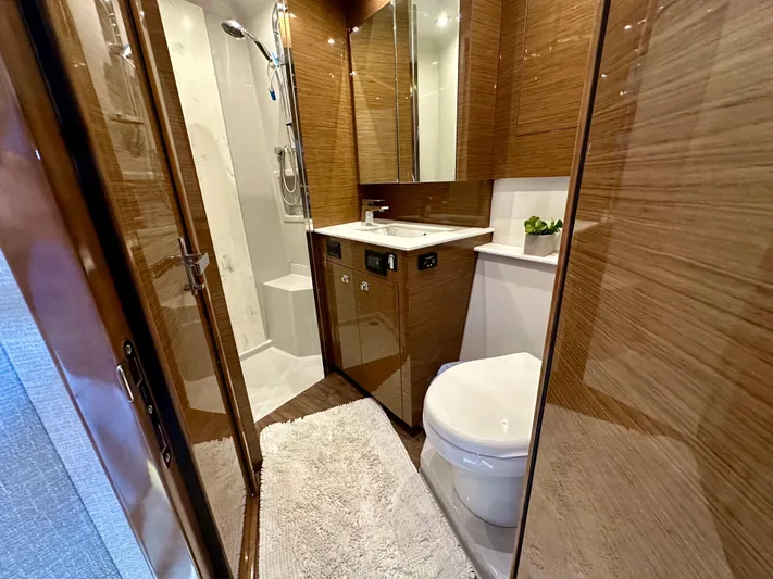  Yacht Photos Pics Luxurious bathroom in 2020 Cruisers Yachts 50 Cantius with modern fixtures and elegant design.