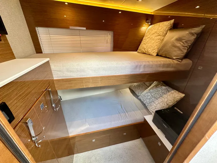  Yacht Photos Pics 2020 Cruisers Yachts 50 Cantius interior with cozy bunk beds and modern design.