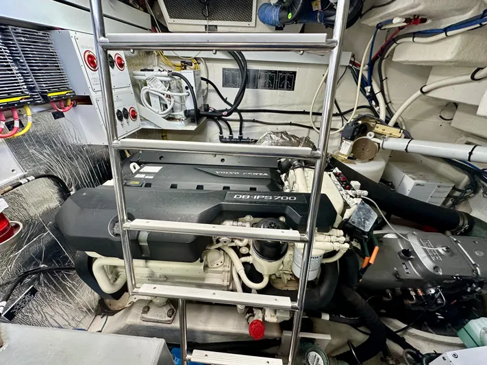  Yacht Photos Pics Engine room of 2020 Cruisers Yachts 50 Cantius with visible machinery and equipment.