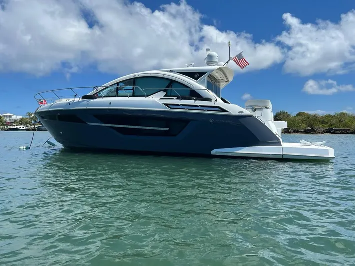  Yacht Photos Pics 2020 Cruisers Yachts 50 Cantius on calm water under blue sky.