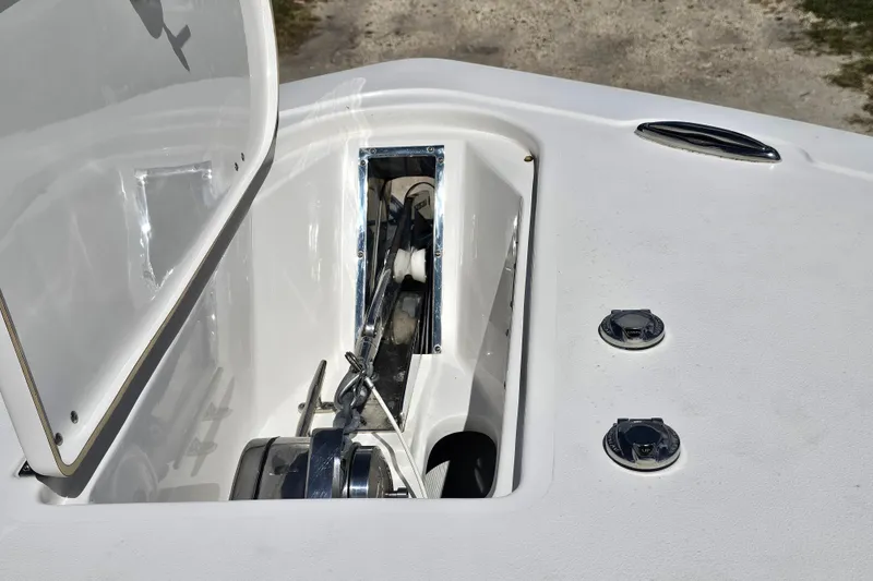  Yacht Photos Pics Open anchor compartment on 2018 Tidewater 320 CC Adventure boat deck.