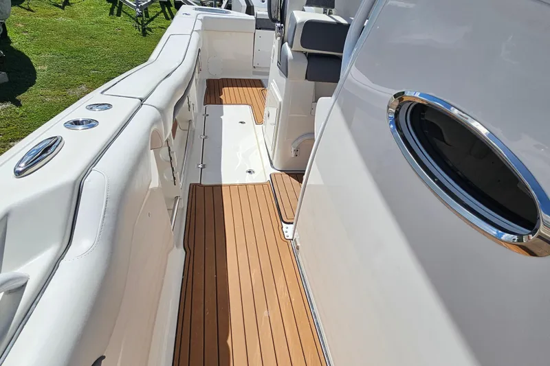  Yacht Photos Pics 2018 Tidewater 320 CC Adventure boat with teak flooring and sleek design.