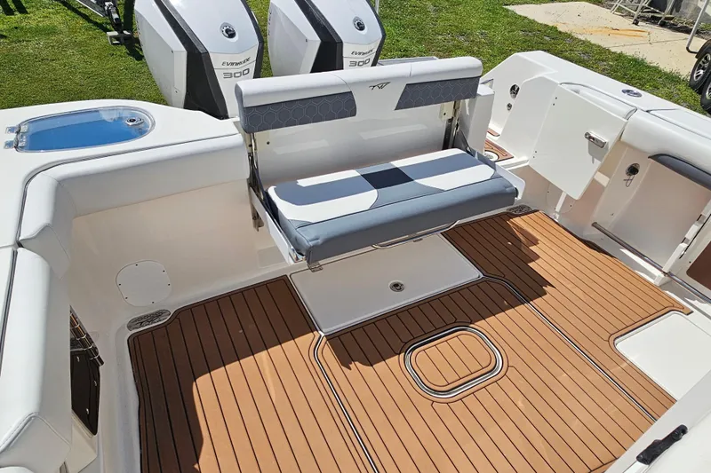  Yacht Photos Pics 2018 Tidewater 320 CC Adventure boat with teak deck and foldable seating.