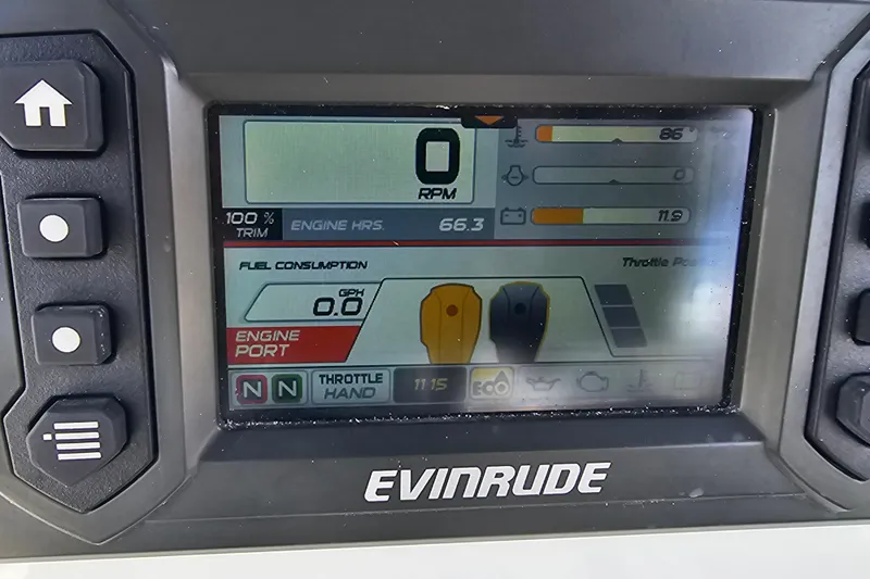 Yacht Photos Pics Evinrude engine display on 2018 Tidewater 320 CC Adventure showing RPM and fuel consumption.