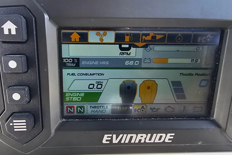  Yacht Photos Pics Evinrude engine display on 2018 Tidewater 320 CC Adventure, showing fuel consumption and engine hours.