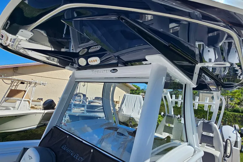  Yacht Photos Pics 2018 Tidewater 320 CC Adventure boat with sleek design and modern features.