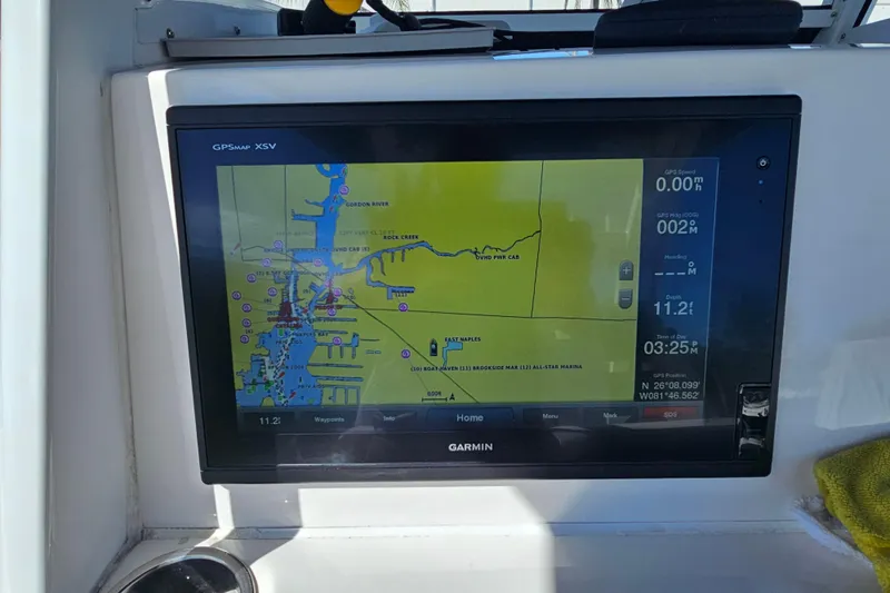  Yacht Photos Pics Garmin GPS display on 2018 Tidewater 320 CC Adventure boat, showing navigation map.