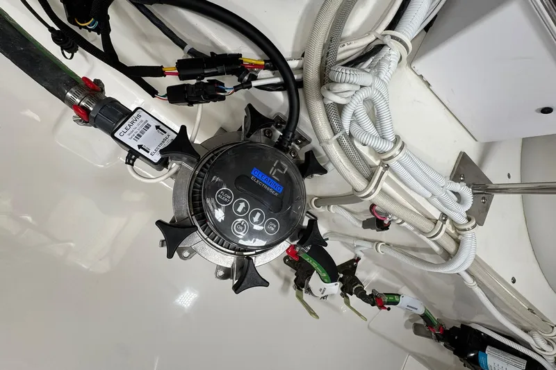  Yacht Photos Pics Engine compartment of 2025 Tiara Yachts 43 LE, showcasing wiring and components.