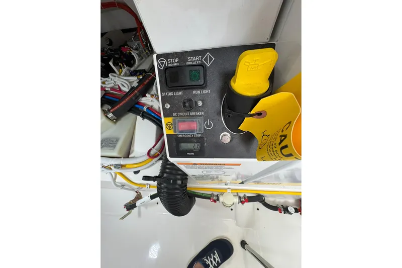  Yacht Photos Pics Control panel of 2025 Tiara Yachts 43 LE with emergency stop and circuit breaker.