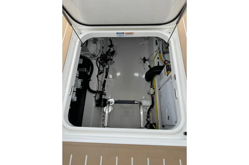  Yacht Photos Pics Engine compartment of 2025 Tiara Yachts 43 LE, showcasing clean and organized layout.