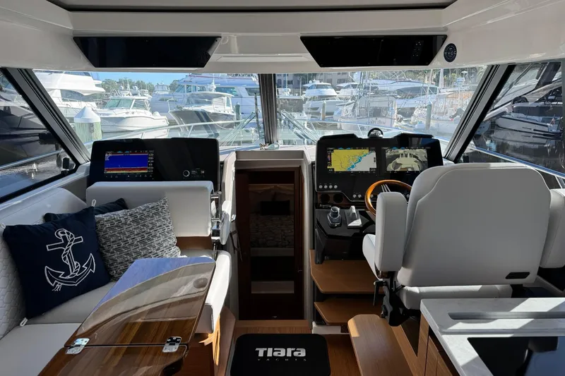  Yacht Photos Pics Interior of 2025 Tiara Yachts 43 LE, featuring modern navigation and seating.