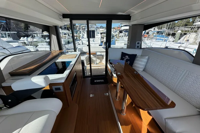  Yacht Photos Pics Interior of 2025 Tiara Yachts 43 LE, featuring elegant seating and modern amenities.