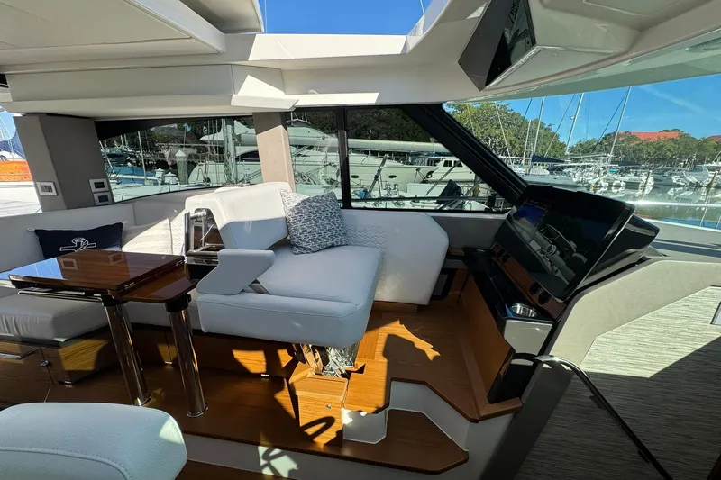  Yacht Photos Pics Luxurious interior of 2025 Tiara Yachts 43 LE with elegant seating and modern design.