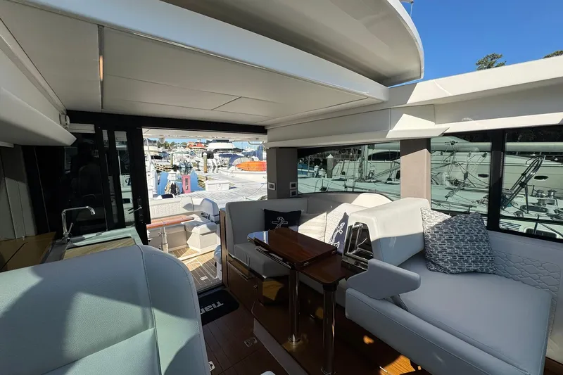  Yacht Photos Pics Luxurious interior of 2025 Tiara Yachts 43 LE, featuring elegant seating and modern design.