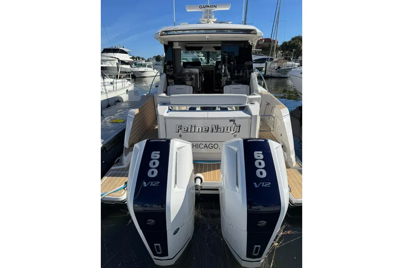  Yacht Photos Pics 2025 Tiara Yachts 43 LE with dual Mercury 600 V12 engines docked in marina.