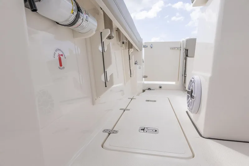  Yacht Photos Pics Manufacturer Provided Image: 2025 Pursuit S 248 Sport boat interior, featuring storage compartments and sleek design elements.