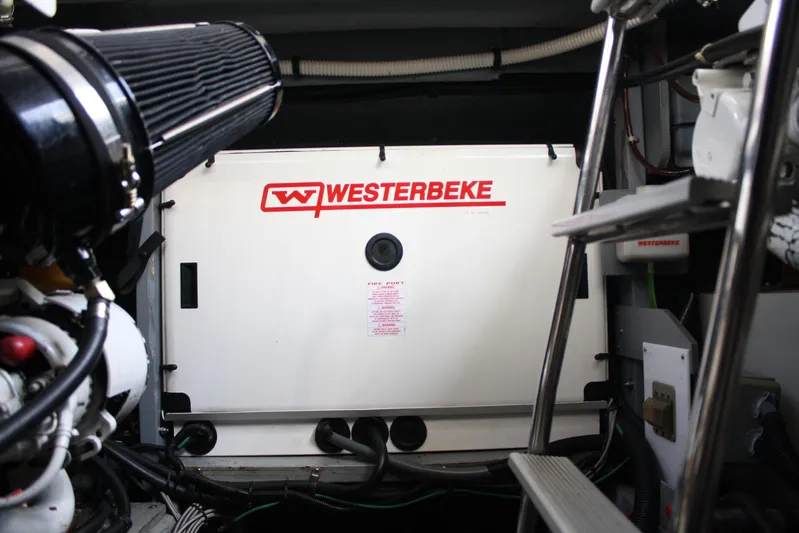 Knot Ez II Yacht Photos Pics Engine room of 1998 Sea Ray 450 Sundancer with Westerbeke generator.