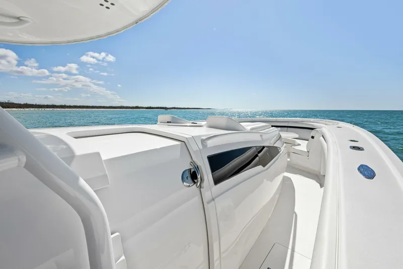  Yacht Photos Pics 2015 Intrepid 475 Panacea boat on open water under clear blue sky.