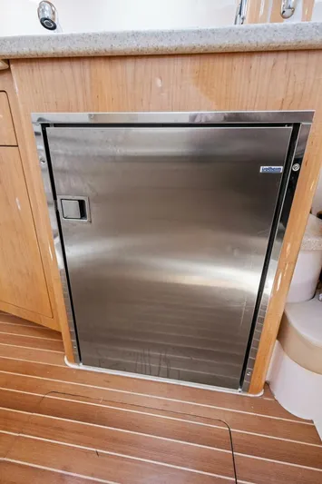  Yacht Photos Pics Stainless steel cabinet door on 2015 Intrepid 475 Panacea boat interior.