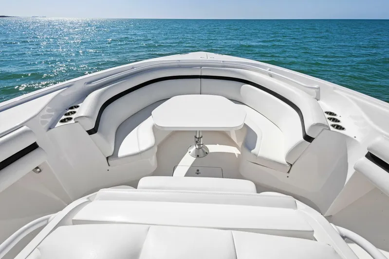  Yacht Photos Pics Bow seating area of 2015 Intrepid 475 Panacea yacht on open water.
