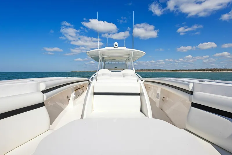  Yacht Photos Pics 2015 Intrepid 475 Panacea boat on open water under blue sky.