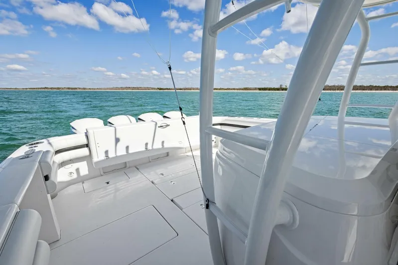  Yacht Photos Pics 2015 Intrepid 475 Panacea boat deck with ocean view and clear blue sky.