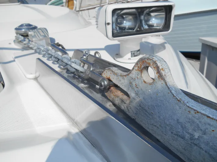 Cygnus Yacht Photos Pics Close-up of anchor chain on 2000 Sea Ray Sundancer 410 boat deck.