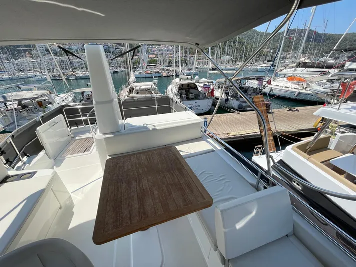  Yacht Photos Pics 2024 Beneteau Swift Trawler 41 Fly, spacious deck view at marina.