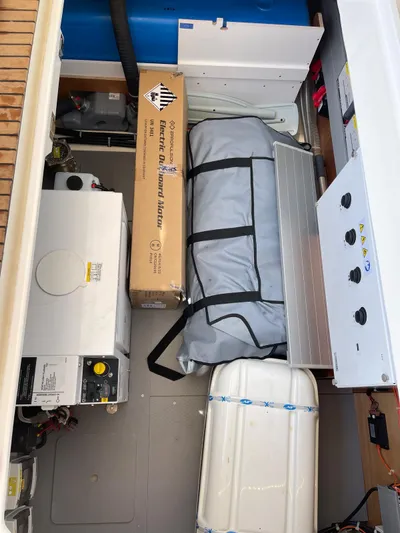  Yacht Photos Pics 2024 Beneteau Swift Trawler 41 Fly engine room with equipment and storage.